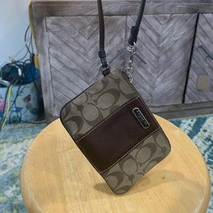 Coach brown and tan wristlet
